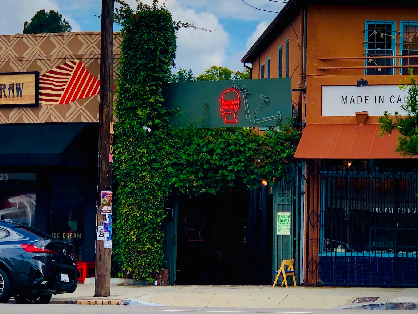 Brain Dead Fabrications signage and gated entrance at 3819 Sunset Blvd.